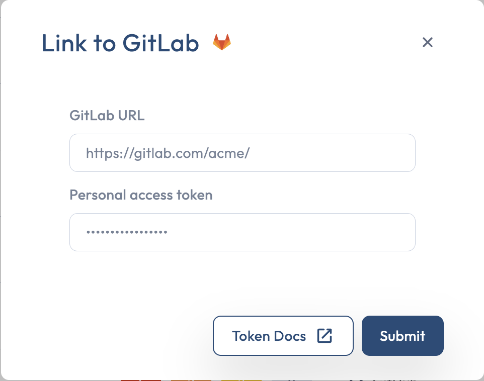 The Connect to GitLab modal LOGIN step with URL and PAT fields